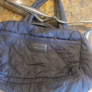 Marc Jacob’s medium gray weekender.